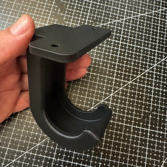 FREE .stl  print file for wheel hanger - under bench mount